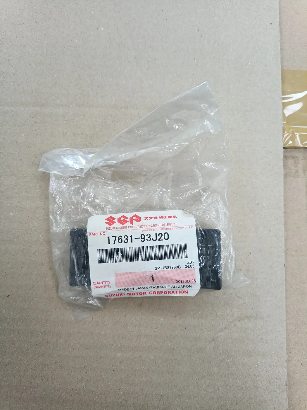 17631-93J20 FILTER,WATER PORT SIDE